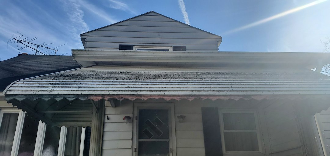 Restoration of an aluminum awning and home in West Newton, Pa